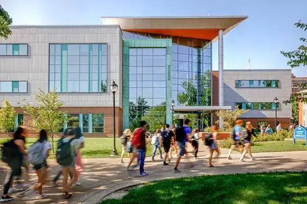 Students walk past the Interdisciplinary Science and Engineering Building